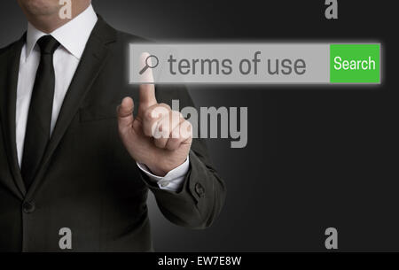 Terms of Use Internet browser is operated by businessman. Stock Photo