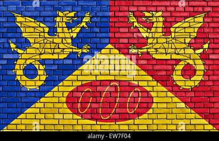 flag of Craig-y-Dorth painted on brick wall Stock Photo