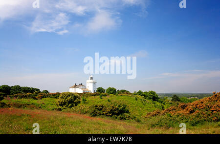 A view of the lighthouse on high cliffs at Cromer, Norfolk, England, United Kingdom. Stock Photo