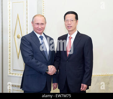 St. Petersburg, Russia. 18th June, 2015. Chinese Vice Premier Zhang Gaoli (R) meets with Russian President Vladimir Putin in St. Petersburg, Russia, June 18, 2015. © Wang Ye/Xinhua/Alamy Live News Stock Photo