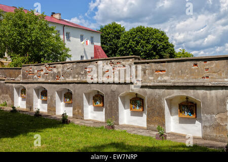 Theme of the Cross Way on walls of sanctuary in Radecznica, Poland. Stock Photo