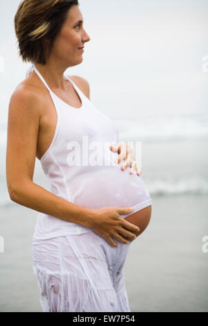 Expecting mom poses for the camera Stock Photo - Alamy