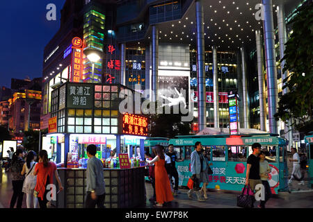 Night View of Nanjing East Road  ( Neon signs lit on )  The street is the main shopping road of the city. Shanghai China Chinese Stock Photo