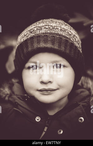 Portrait of a boy wearing a wooly  hat Stock Photo