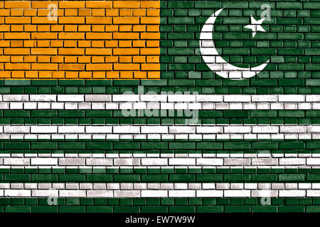 flag of Azad Kashmir painted on brick wall Stock Photo