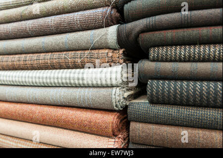 Pile of colorful cotton and wool textile on store Stock Photo