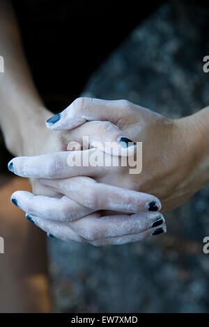 A climber's black manicure appears slightly worse for wear after a bouldering session at Indian Rock in Berkeley, California. Stock Photo