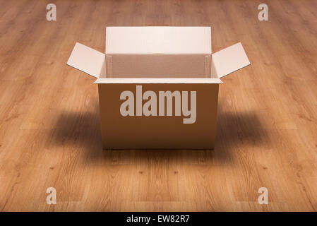 Empty brown carton box on the wooden floor Stock Photo