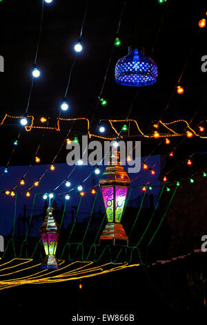 Israel, Jerusalem. 19th June, 2015. An alley in the Muslim Quarter decorated with festive lights during the Muslim holy month of Ramadan in the Old City of Jerusalem. Muslims worldwide observe a month of fasting to commemorate the first revelation of the Quran to Muhammad according to Islamic belief. Credit:  Eddie Gerald/Alamy Live News Stock Photo