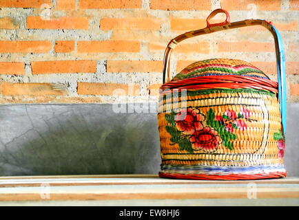 Tiffin carrier from Chiness, isolated on wooden table Stock Photo