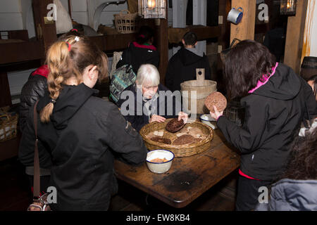 Ireland, Co Wexford, New Ross, visitors examining rations inside steerage cabin of 1845 emigrant ship Dunbrody Stock Photo