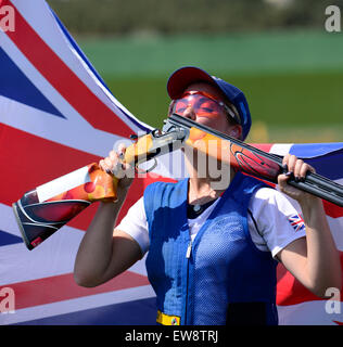 Baku, Azerbaijan. 20th June, 2015. Amber Hill from Britain kisses her shotgun after competing in the final of the women's shooting skeet at the European Games in Baku, Azerbaijan, June 20, 2015. Amber Hill claimed the title of the event. Credit:  Xinhua/Alamy Live News Stock Photo