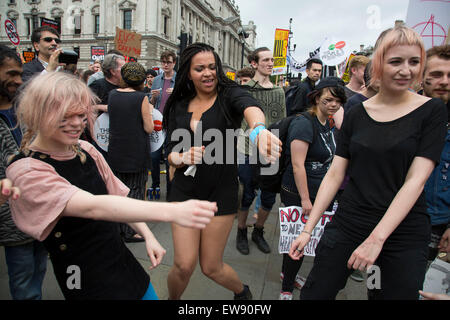 London, UK. Saturday 20th June 2015. People's Assembly against austerity demonstration through Central London. 250,000 people gathered to protest in a march through the capital protesting against the Tory cuts, holding placards and banners. Group of young women dancing in Parliament Square. Credit:  Michael Kemp/Alamy Live News Stock Photo