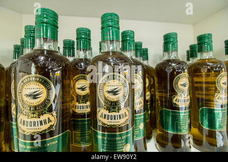 BEJA, PORTUGAL - APRIL, 2015 - Andorinha olive oil product bottles on a shelf. Stock Photo