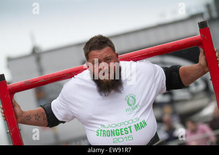 St Johns Square, Blackpool, Lancashire. 20th June, 2015. Ryan England weightlifter at the Charity Strongman event which is hosted by Blackpool BID.Blackpool's Strongest Man Competition kicked off National Armed Forces Week in style with Ex Forces Personnel and Civilians alike proving themselves in strong man events to win the male weight lifter coveted, virility, manliness, maleness, vigour, strength, muscularity, ruggedness, toughness, robustness masculinity title. Stock Photo