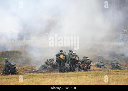 RUSSIA, BORODINO - OCTOBER 12: Unidentified armed german soldiers defence on reenactment of the battle in WWII near the Borodino village in 1941, in Moscow region, Borodino, on 12 October, 2014, Russia Stock Photo