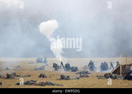 RUSSIA, BORODINO - OCTOBER 12: Unidentified soldiers shooting by grenade launcher on reenactment of the battle in WWII near the Borodino village in 1941, in Moscow region, Borodino, on 12 October, 2014, Russia Stock Photo