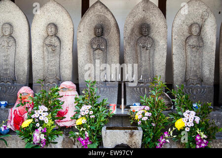 Large Japanese Jizo, AKA Ojizo-sama, Jizo bosatsu, statue with hundreds ...