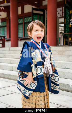 Japan, angelic 5 year old Caucasian child, boy, in kimono sitting ...