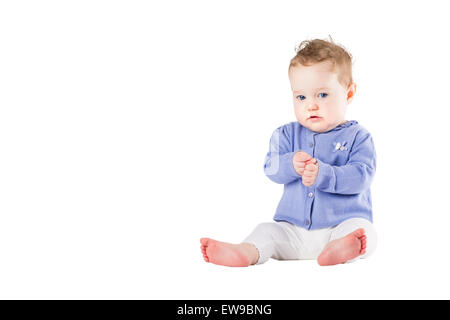 Beautiful baby girl wearing a purple sweater clapping her hands, isolated on white Stock Photo