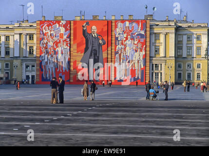 April 30, 1984 - Leningrad, Russia - A giant banner with an image of Vladimir Lenin, Communist revolutionary and first leader of the USSR, and figures representing workers, covers a building faÃ§ade overlooking the Palace Square, the central city square of Leningrad (St. Petersburg), decorated for the annual May Day Parade. (Credit Image: © Arnold Drapkin/ZUMA Wire) Stock Photo