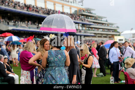 London, UK. 20th June, 2015. Race-goers are seen on the fifth day of Royal Ascot at Ascot Racecourse in Ascot, Britain on June 20, 2015. Credit:  Han Yan/Xinhua/Alamy Live News Stock Photo