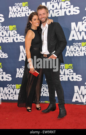 LOS ANGELES, CA - JUNE 5, 2011: Nikki Reed & Paul McDonald arriving at the 2011 MTV Movie Awards at the Gibson Amphitheatre, Universal Studios, Hollywood. Stock Photo