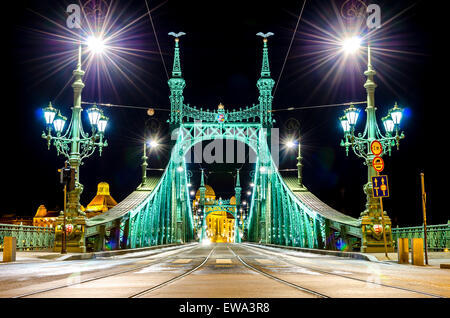 Liberty bridge crossing the River Danube in Budapest, Hungary at night Stock Photo