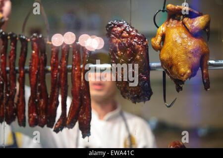 Roasted chicken and pork meat on skewer. Stock Photo