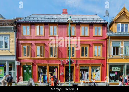 An historic timber constructed store on the harbour front in the Arctic town of Tromso, Norway. Stock Photo