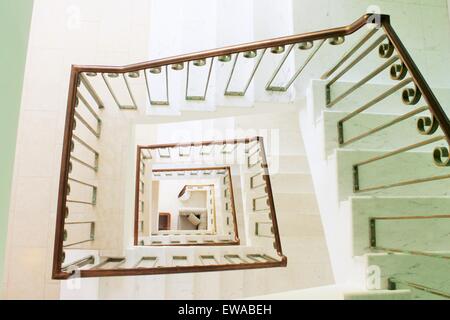 Spiral square stairs viewed from above Stock Photo