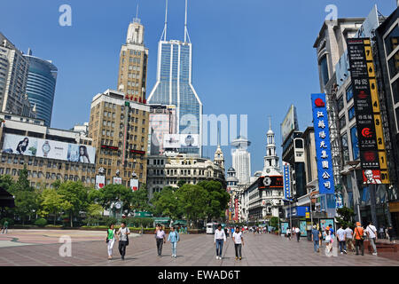 Visitors at Nanjing Road. Main shopping street of Shanghai. One of the busiest shopping streets in the world . East Nanjing Road Stock Photo