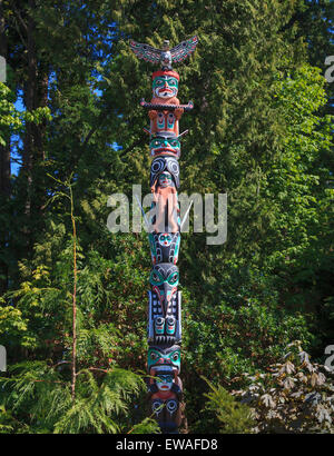 Vibrant totem pole at Brockton Point in Stanley Park - Vancouver, British Columbia, Canada Stock Photo