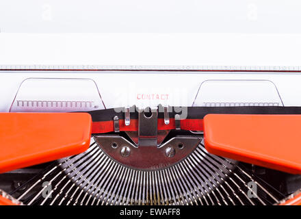 Image shows the word Contact, written on an old typewriter Stock Photo