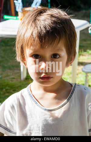 cute 3 year old boy with blue eyes