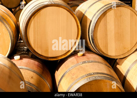 French oak barrels stacked at the winery Stock Photo