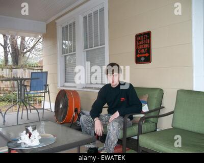 A photo from a white supremacist website showing Dylann Storm Roof posing on a porch March 19, 2015. Roof murdered nine members of the Emanuel African Methodist Episcopal Church in a racially motivated killing on June 17, 2015 in Charleston, S.C. Credit:  Planetpix/Alamy Live News Stock Photo