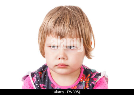 Cute small Caucasian blond baby girl angry frowns, studio portrait isolated on white background Stock Photo