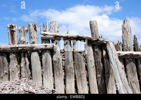 Old weathered  wooden groynes on Porlock Wier beach Somerset National Park England Stock Photo