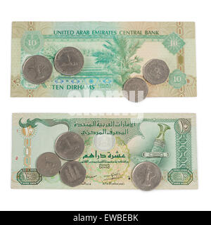 Ten Dirham Note and Coins, Currency of the United Arab Emirates on wooden table Stock Photo