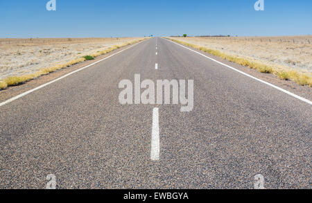 Highway road in open, arid country, outback Queensland, Australia Stock Photo