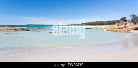 White sand and turquoise water on a beautiful beach along the Bay of Fires coast in north-east Tasmania, Australia Stock Photo