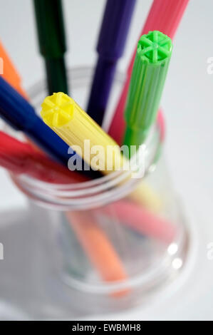 colourful fibre tip pens in plastic container Stock Photo