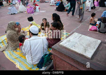 Traditional Iftar (fast-breaking) at Jama Masjid during Ramadan. Old Delhi, India. Stock Photo