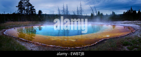 Morning Glory Pool is a hot spring in the Upper Geyser Basin of Yellowstone National Park in the United States. Stock Photo