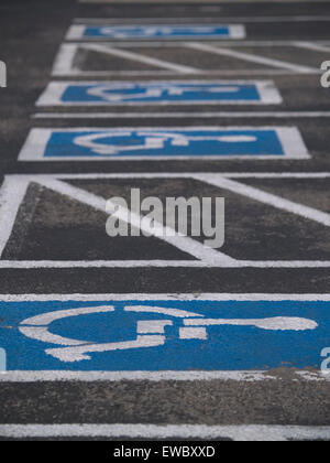Handicapped parking spots clearly marked in a aparking lot near Winslow, Arizona. Stock Photo