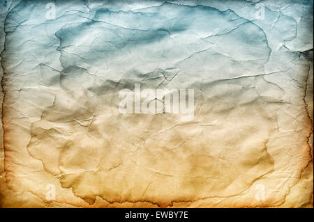 Old creased stained paper background or texture, space for text. Stock Photo