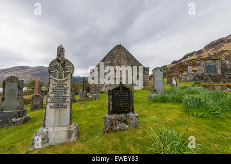 Graveyard and Chapel in Ault A'Gruinn in the Highlands of Scotland with lake, snow and piles of stone, image Daan Kloeg, Commee Stock Photo