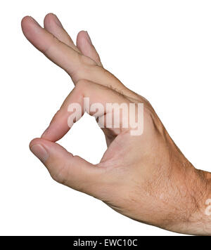 White man doing an OK gesture with his hand, on a white background. Stock Photo