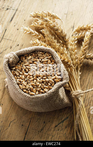 Wheat grain in small canvas sacks Stock Photo